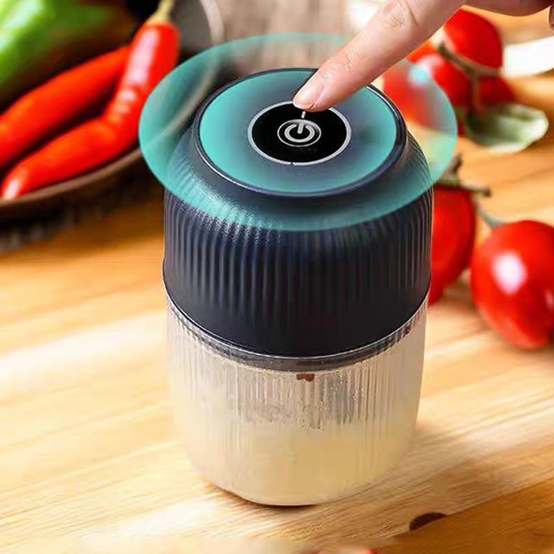 Portable mini chopper four blade cutting system